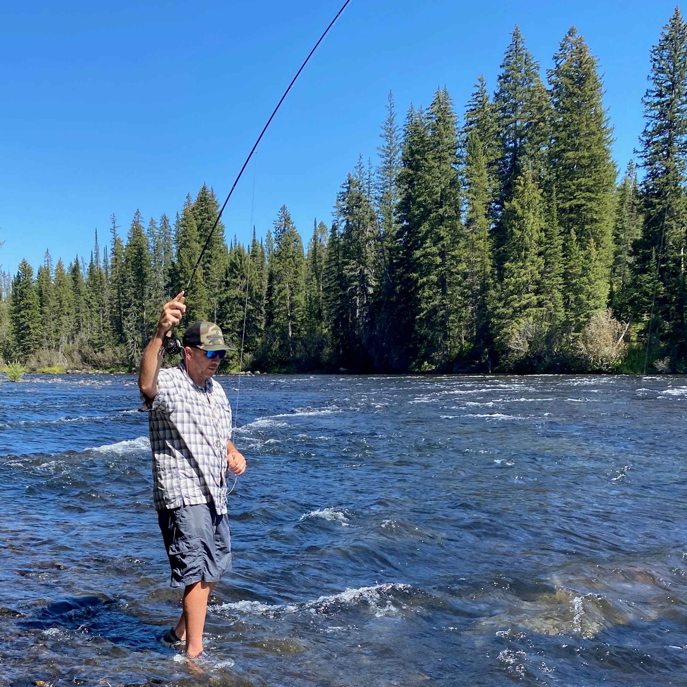 Matt Brown doing some fun summer fly fishing on a beginner stream