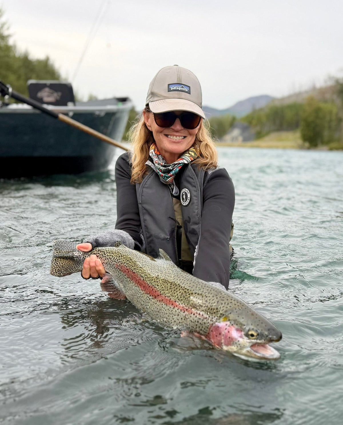 Dallas Voss holding a Kenai River rainbow trout