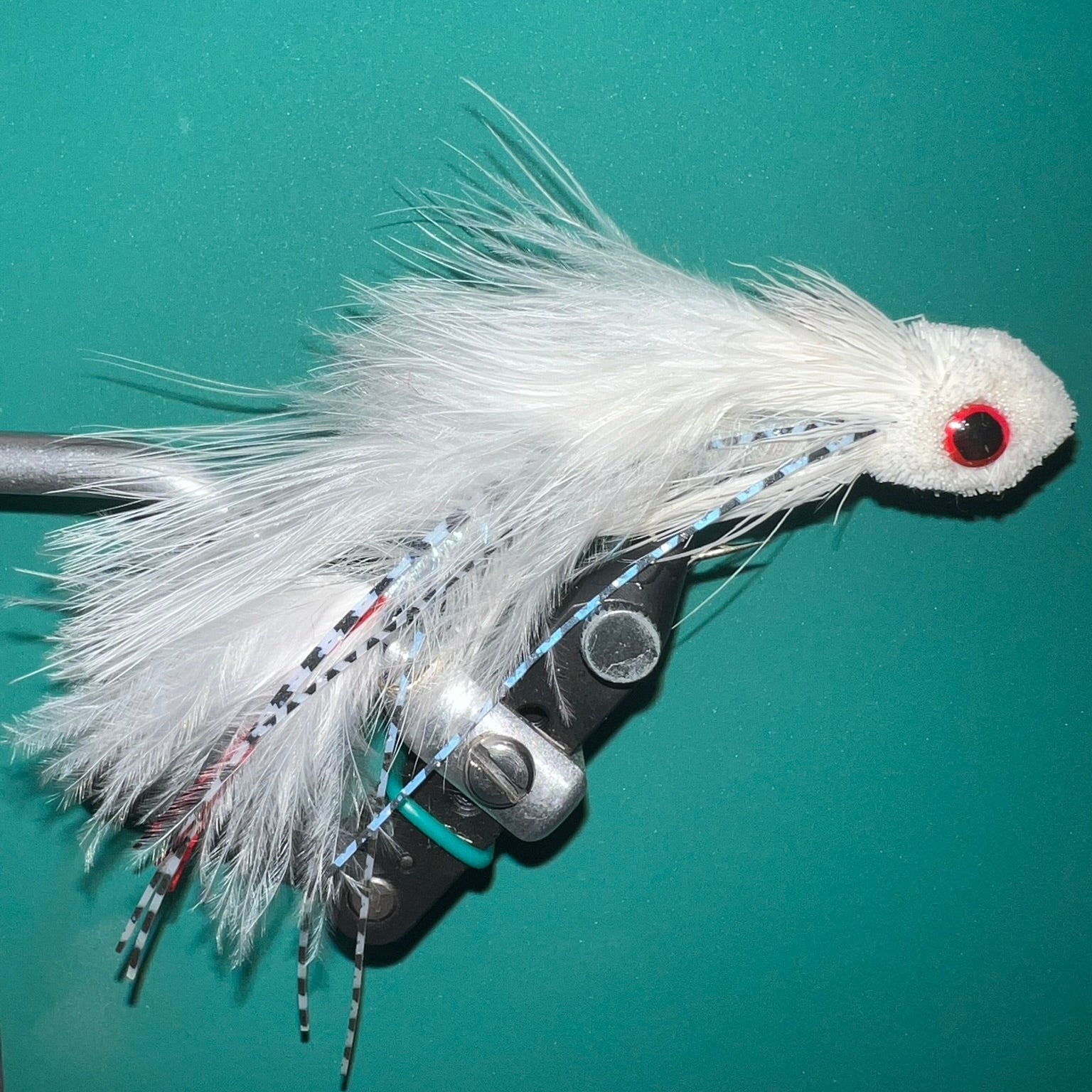 White articulated Sex Dungeon streamer fly for big brown trout