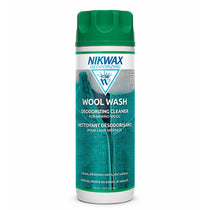 Nikwax Wool Wash deodorizing cleaner in green-capped bottle, front label