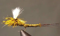 Yellow and gold feather fishing lure tied on a hook
