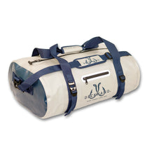 3-Day dry duffle bag in cream with navy straps and front zip pocket.