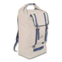 Cream dry duffle bag with blue cross straps and front zippered pocket with buckles