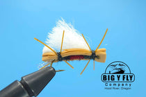 Fishing lure with white feather puff, orange body wrap, dark hook and tinsel