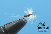 Mayfly dry fly with white hackle tuft and dark hook