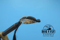 Morrish mouse fishing fly with black head and tan tail fur on a hook