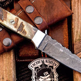 ﻿  Damascus steel handmade skinning knife