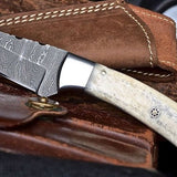 Damascus steel gut hook skinning knife