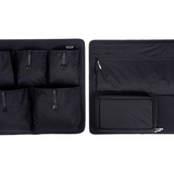Black rear door storage panels with multiple straps and pocket compartments