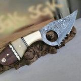 Damascus Steel Handmade Finger Hole Skinning Knife with Bone-Rose Wood and Brass Bolster Handle, Serrated Edge