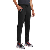 Men's black wading pants with drawstring waist and logo patch on the thigh