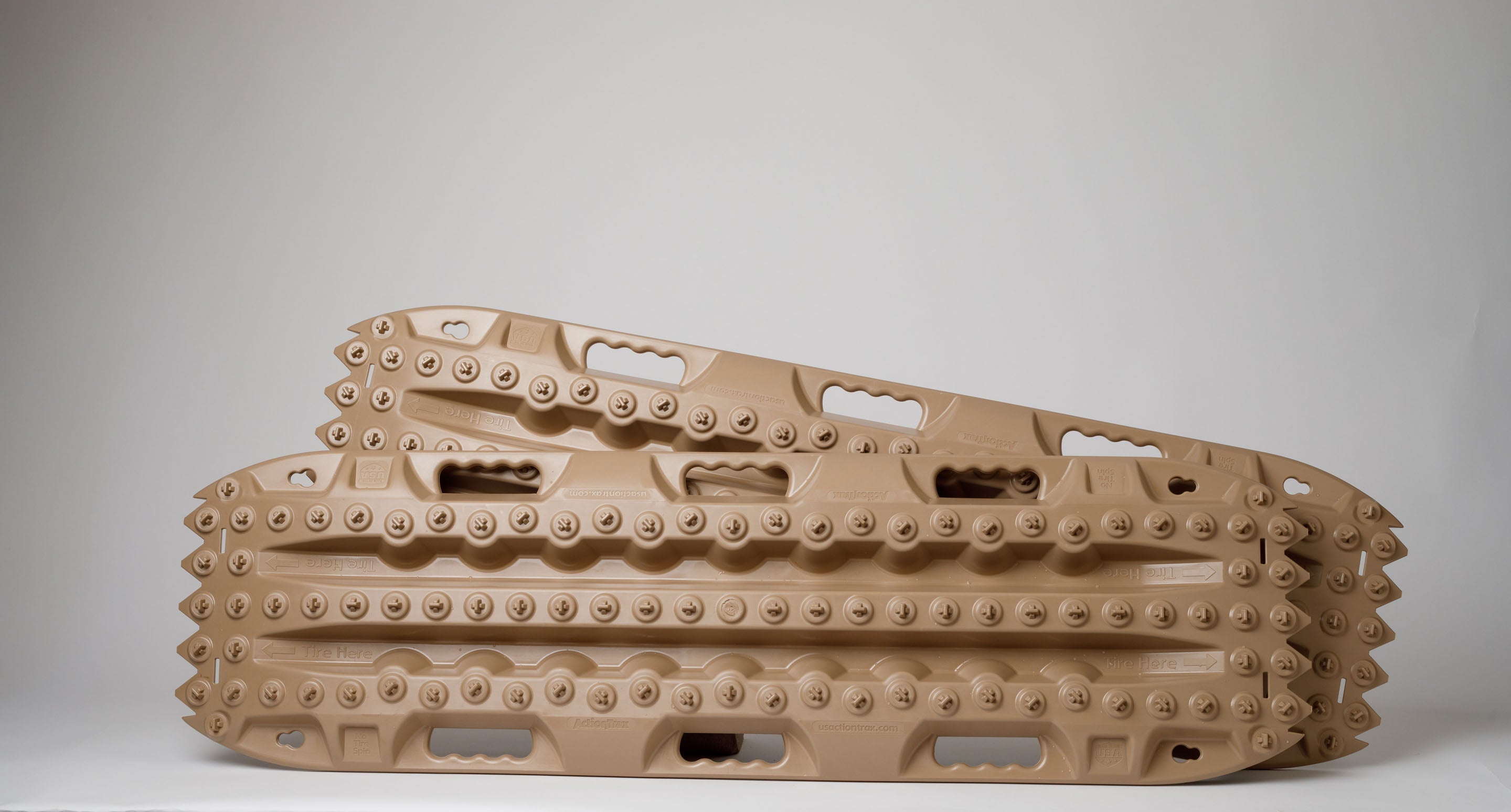 Tan recovery traction boards (pair) with studded tread pattern