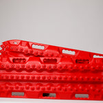 Red traction recovery boards, pair with studded tread surface