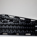 Black off-road traction recovery boards (pair) with studded tread surface