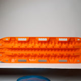Orange traction recovery boards with toothed tread edges, pair