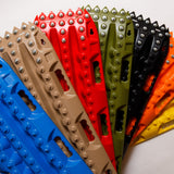 Blue recovery traction mat with metal teeth and raised grip studs