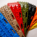 Set of color traction recovery mats with metal teeth, blue red black and green