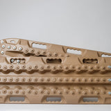 Tan recovery traction mat with metal teeth studs, arched tread design