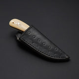 The Fieldmaster's Companion: 7.5-Inch Skinning Hunting Knife with Full Tang D2 Steel Blade, Bone Handle, and Steel Bolster