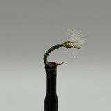 Chironomid buzzer fly lure on black stem, green segmented body, feather tail, gold head