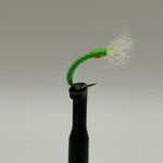 Chironomid buzzer fly lure on black stem, bright green body, white feather tail, barbed hook