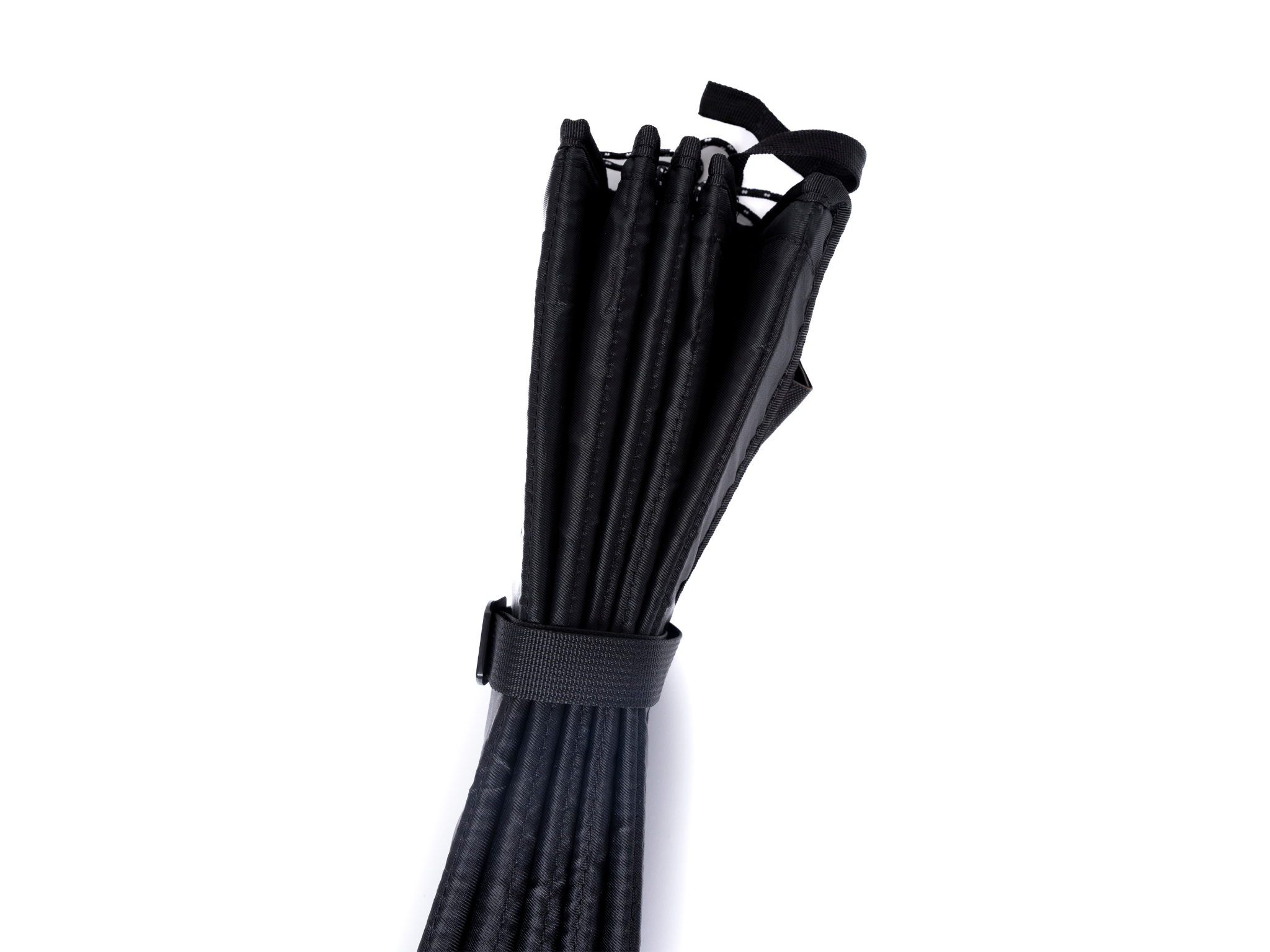 Black privacy curtain bundle with attached straps and rolled fabric panel