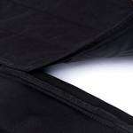 Black privacy curtain seam close-up with double-stitched edge binding