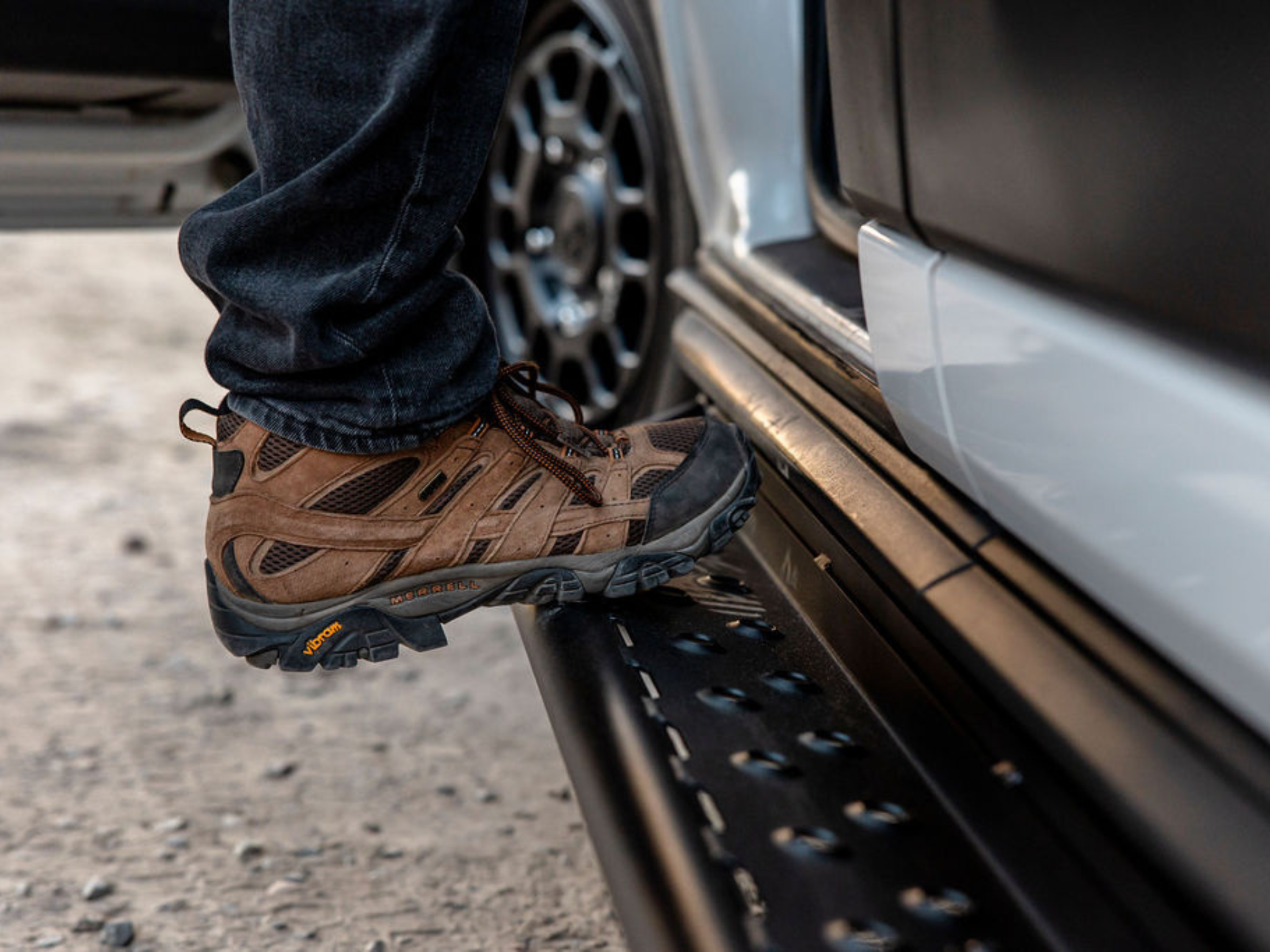 Ford Transit side step running board with perforated black steel tread