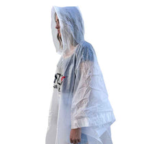 Light blue hooded rain poncho worn, translucent fabric, side view