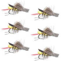 Yellow foam grasshopper fly lure with gray bristles, red thread, and barbed hook