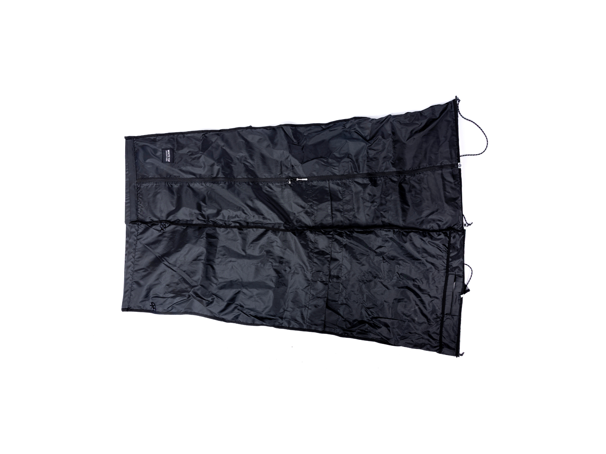 Black shower kit carry bag laid flat with drawstring tie closures