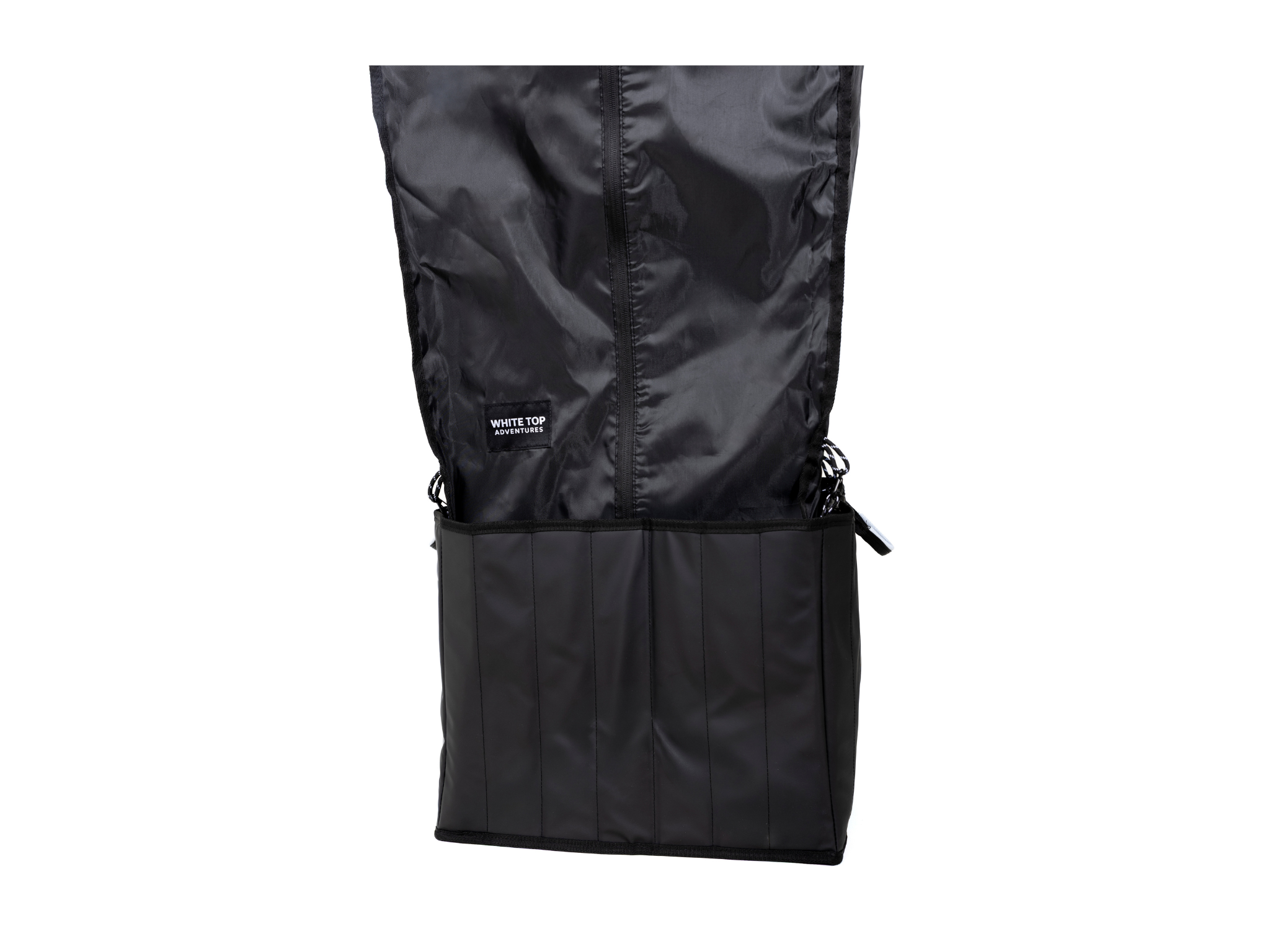 Hanging shower kit with black fabric cover and zippered lower storage pocket