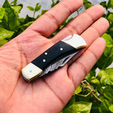 Custom Handmade Damascus Steel Small Folding Pocket Knife with Buffalo Horn Handle and Leather Case by KBS Knives Store.