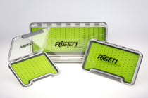 Waterproof fly box set with open transparent case and bright green silicone insert panels.