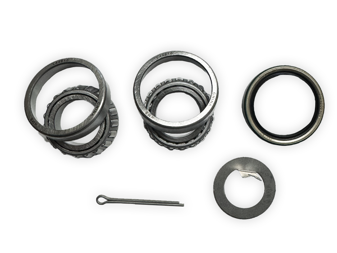 Trailer bearing kit showing bearings, seal, and metal retaining ring with pin