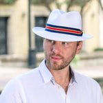 White paper braid fedora-style hat with multicolor striped band