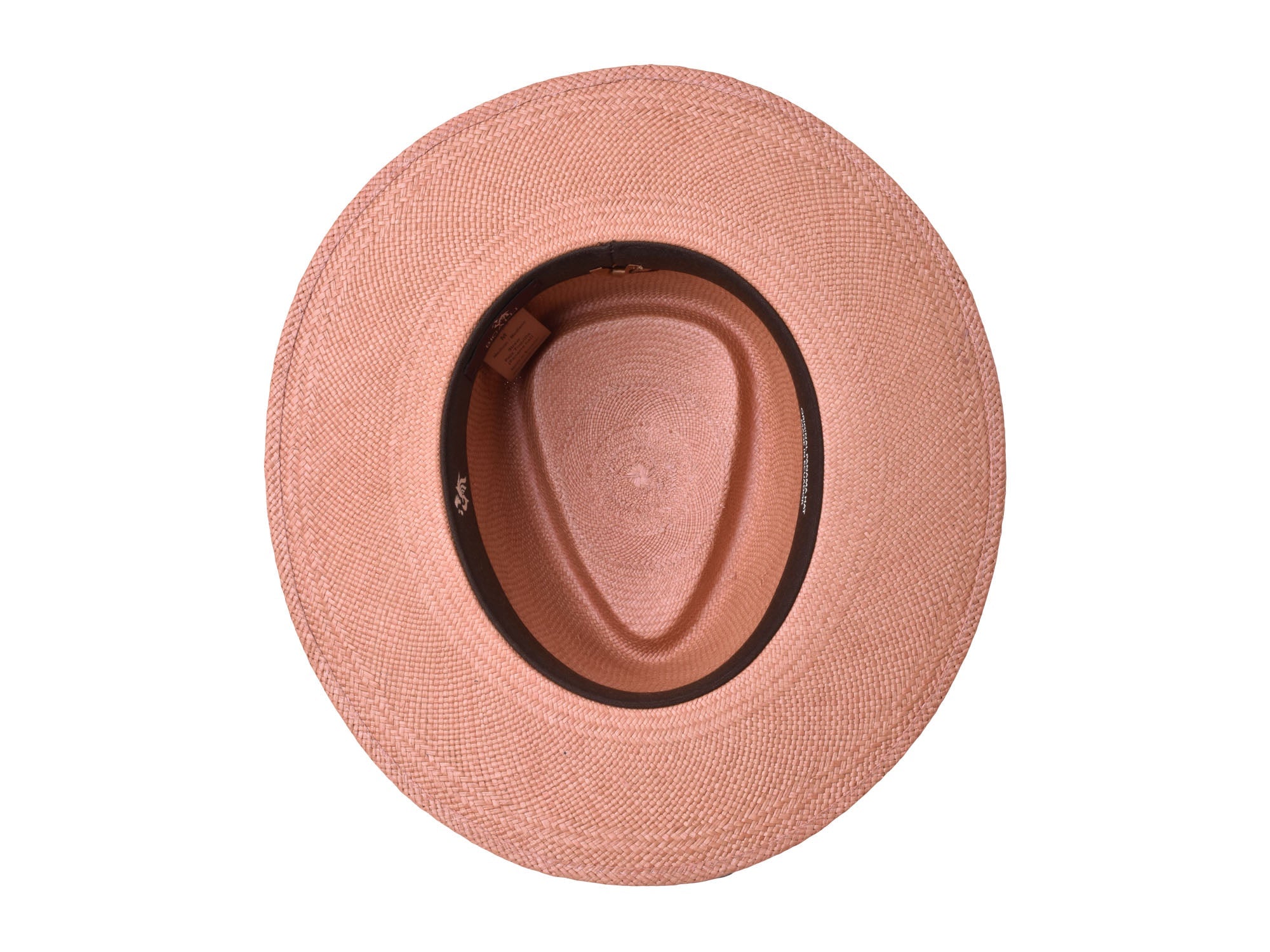 Pink woven Panama hat with dark brown inner brim, underside view.