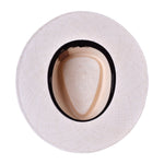 Panama hat Amara in putty color with black band and empty oval crown