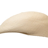 Natural straw Panama-style ascot hat, side view with short curved brim.