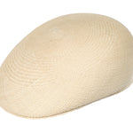 Natural straw Panama-style ascot hat with rounded crown and short brim.