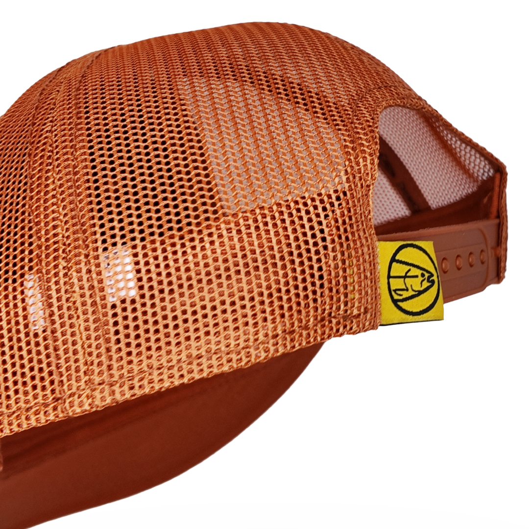 Orange mesh back trucker hat with side snap strap and circular logo patch