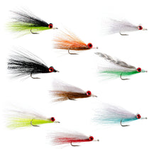 Assorted minnow fly lures with red eyes on hooks, orange green and white bodies