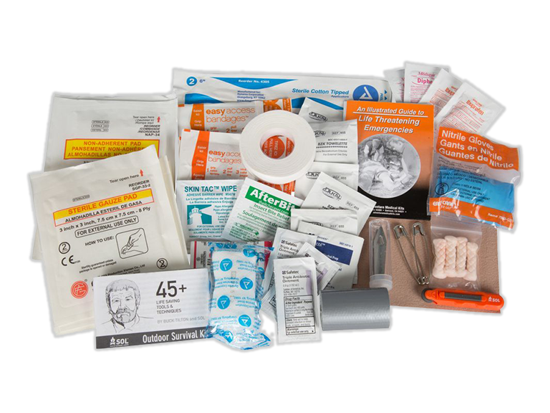 Ultralight medical kit supplies in opened kit bag: wipes, gloves, tape, tools