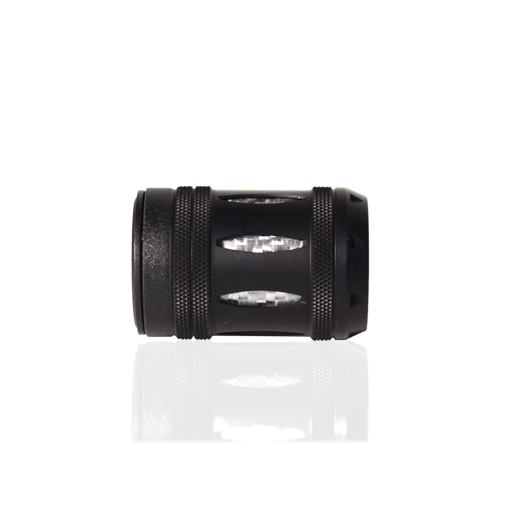 Black aluminum fishing reel nut close-up of textured bands and silver insert