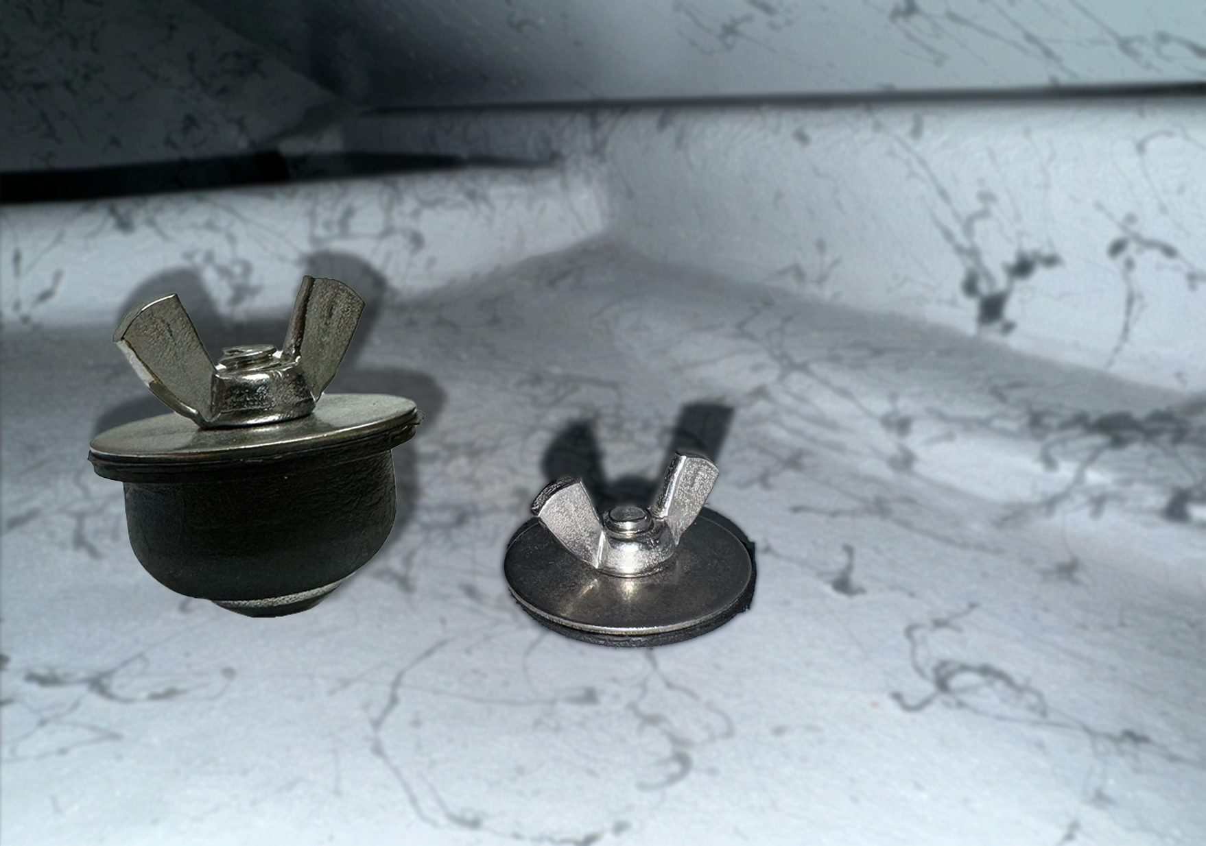 Drift boat drain plug set of 2, silver caps on black rubber bases