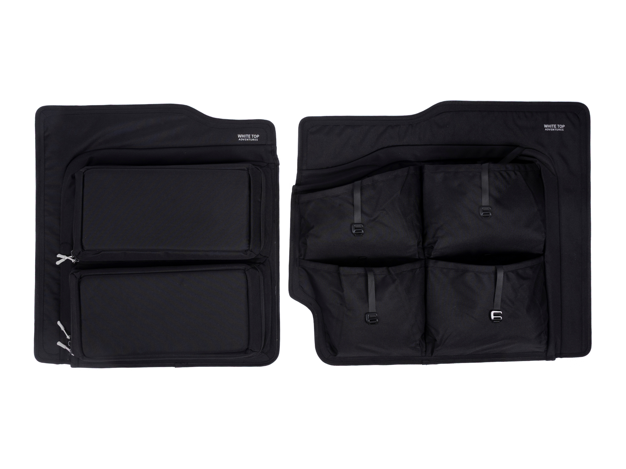 Pair of black lower rear door storage panels with multiple zip pockets