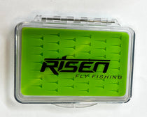 Mini fly box with clear lid and bright green silicone insert with lure compartments