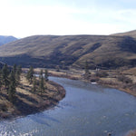 River with hills and trees, fly-fishing water scene