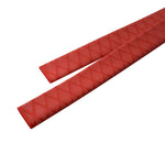 Red heat shrink tubing with crisscross grid texture and open ends