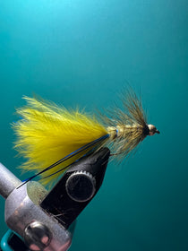 Yellow and black feather fishing lure with hook